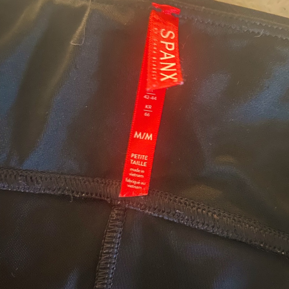 Spanx  size medium shiny faux leather leggings worn twice!